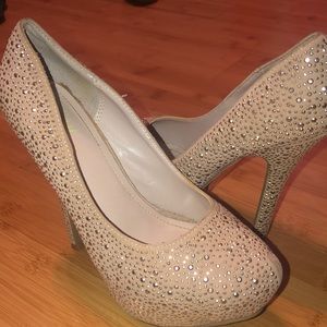 Nude rhinestone pumps